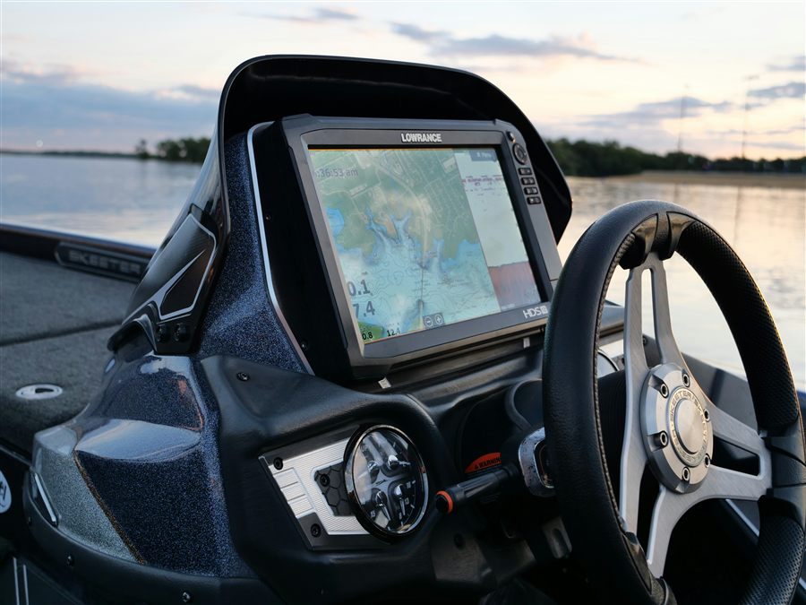 Lowrance fish finder mounted at the helm of a bass boat