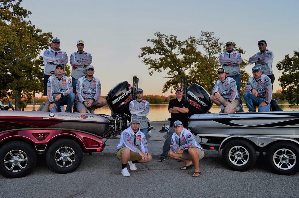 RSU Fishing Team group photo with boats